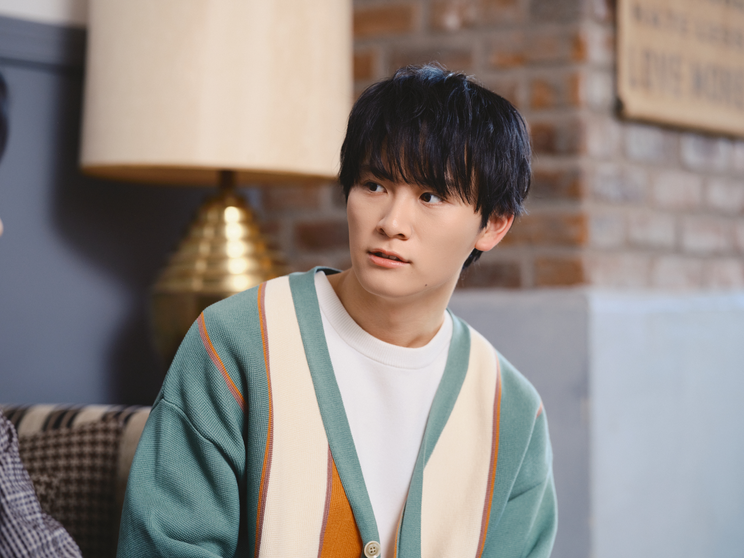 インタビューに答える山﨑光さん