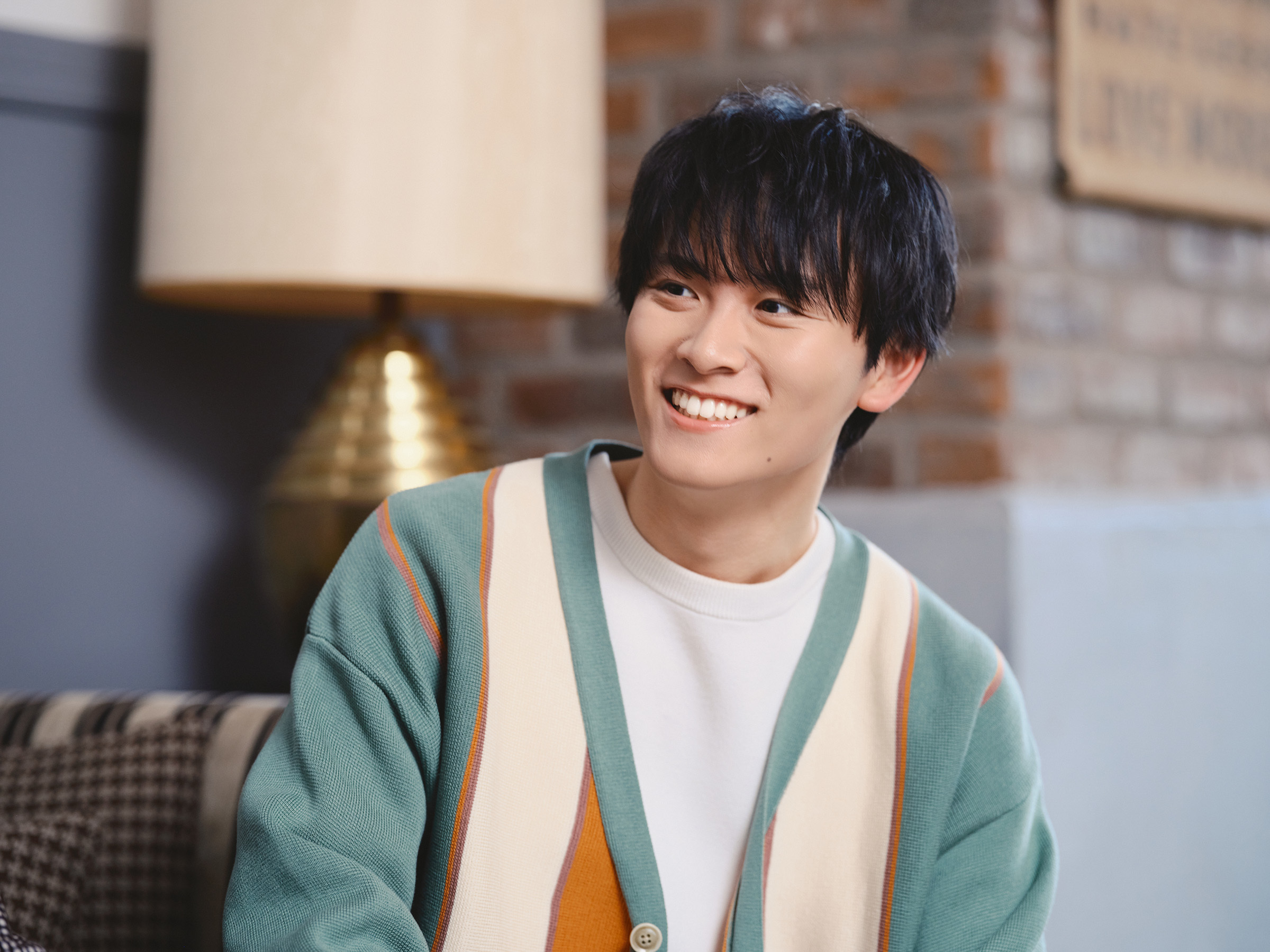 インタビューに答える山﨑光さん